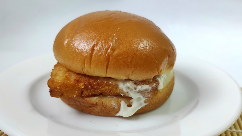 Filet-O-Fish sandwich sitting on a white plate