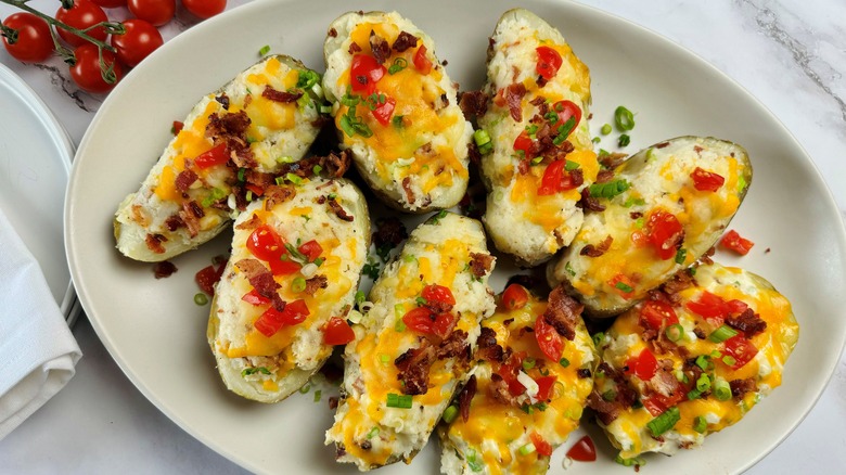 baked potatoes with tomatoes