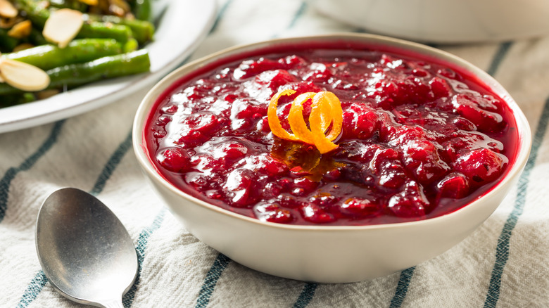 Cranberry sauces garnished with orange peel