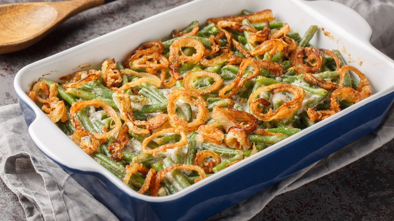 A green bean casserole topped with fried onions