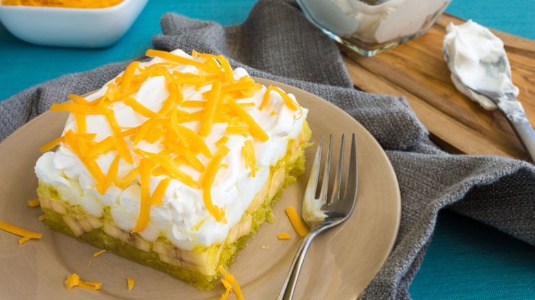 Jell-O salad topped with whipped cream