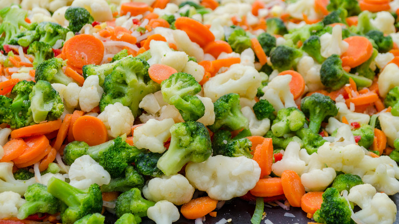 Diced carrots, broccoli, and cauliflower mixture close-up.