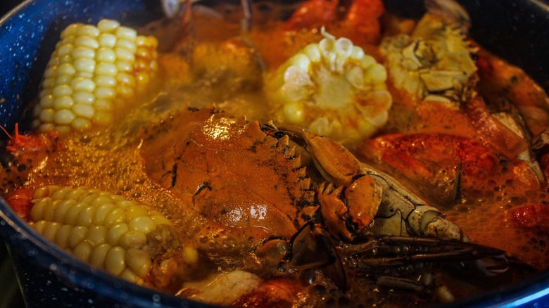 A crab boil with corn