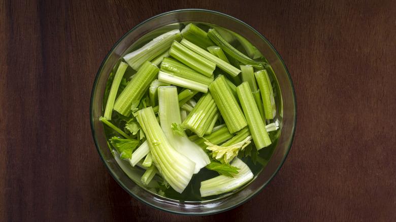 cut celery in water overhead view