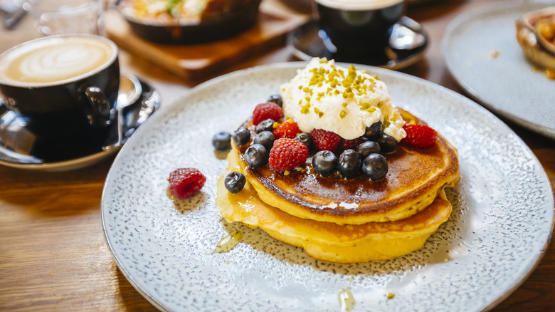 stack of pancakes with fruit