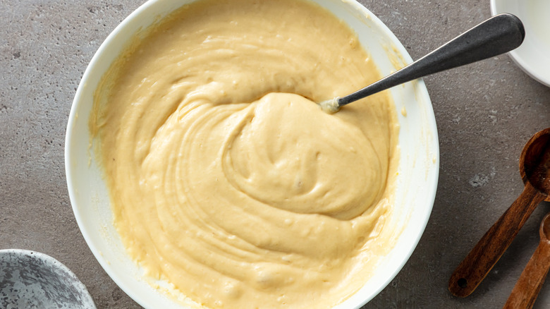 whisk in bowl of pancake batter