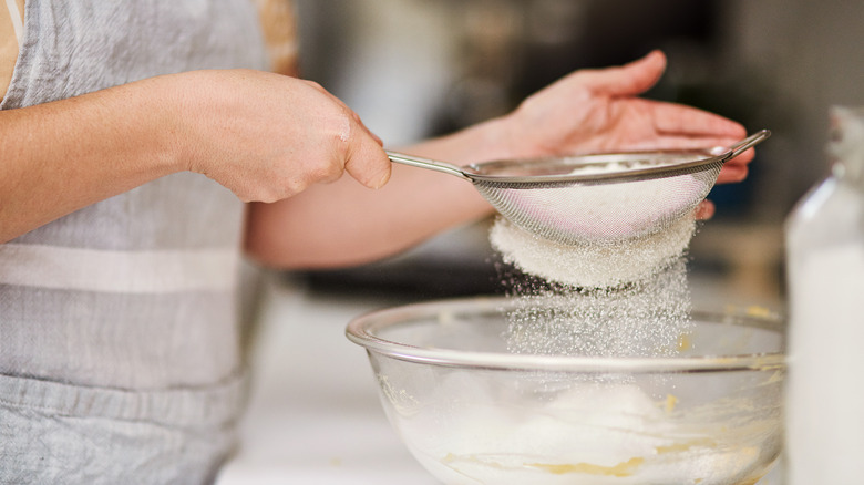 sifting pancake mix