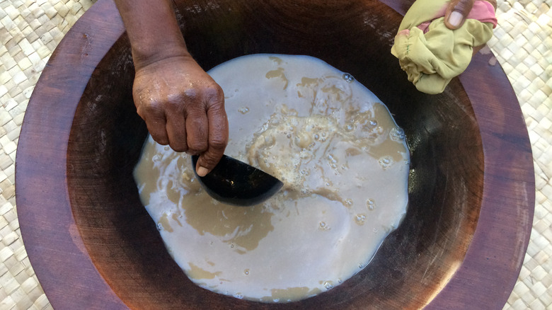 making kava in a traditional ceremonial bowl