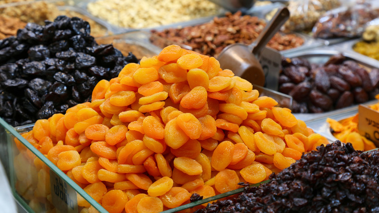 Apricots and prunes at a market 