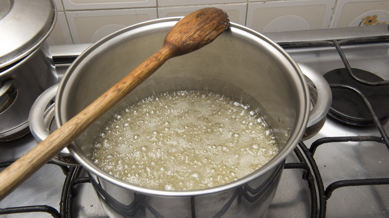 Sugar syrup cooking in pan