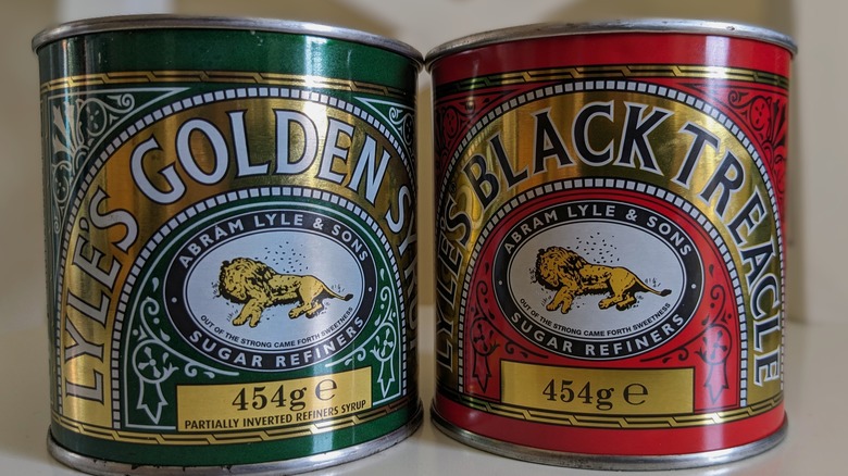 Cans of Lyle's Golden Syrup