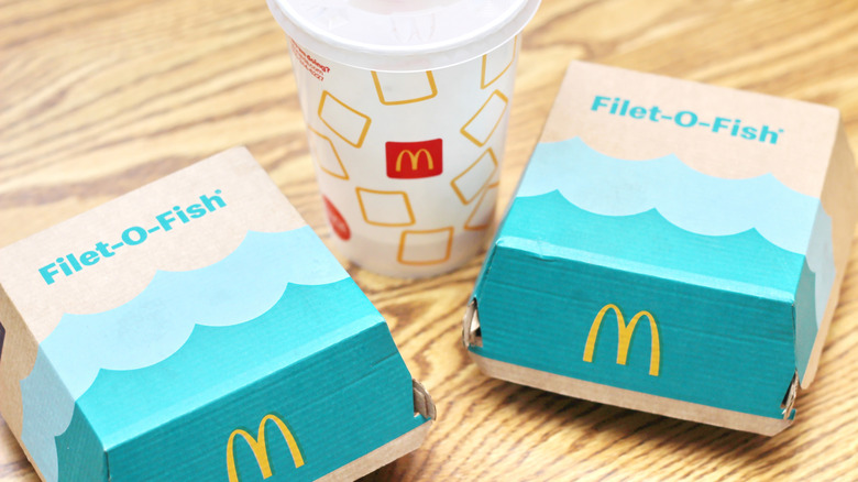 McDonald's Filet-O-Fish containers with a soda cup