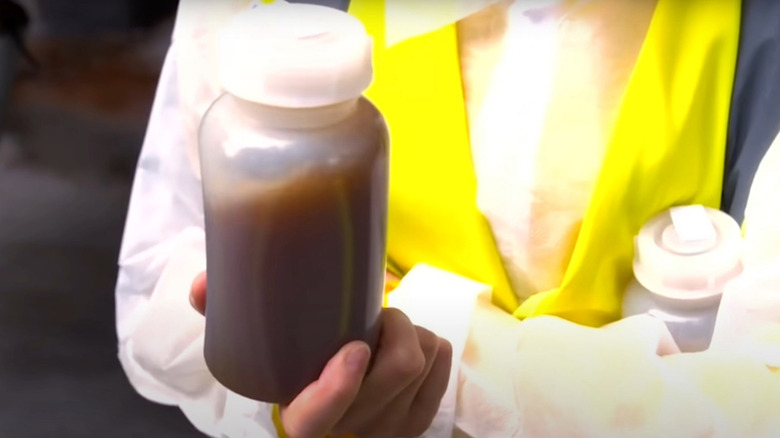 Plastic bottle of liquid brown yeast extract.