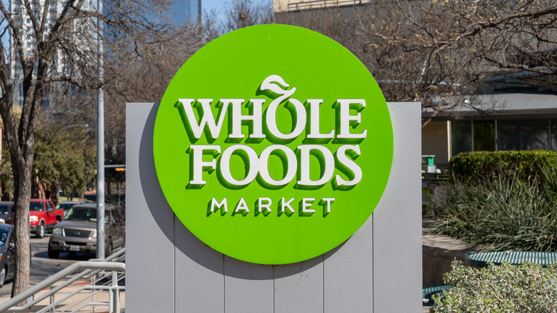 A close-up of a Whole Foods Market logo