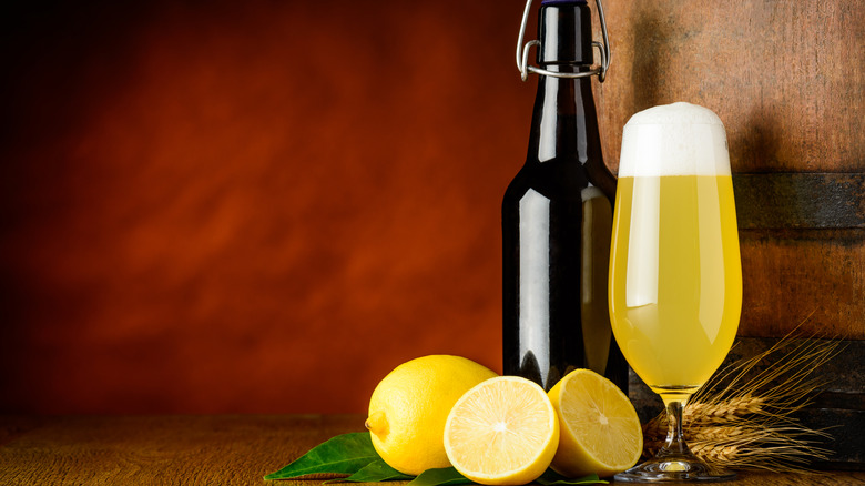 fluted glass of citrus beer 