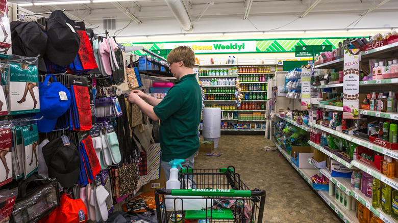 An employee working at the Dollar Tree