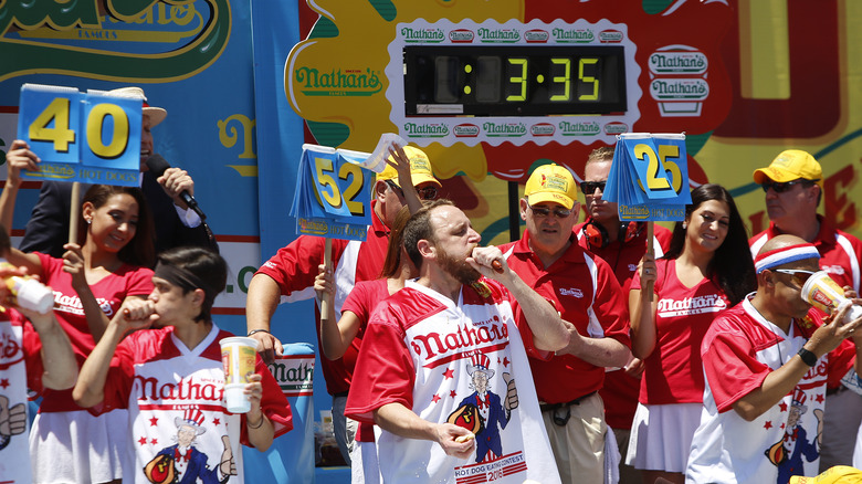 Joey Chestnut and competitors