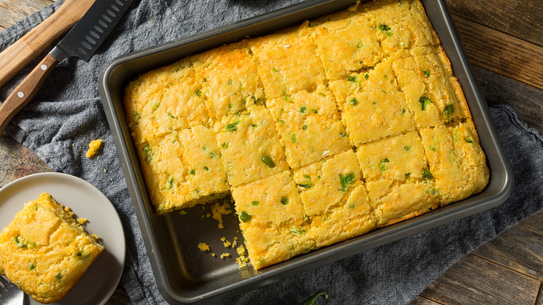 Cornbread with jalapeño chilis in baking pan