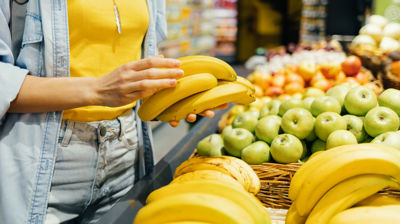 Bananas at a supermarket checkout counter