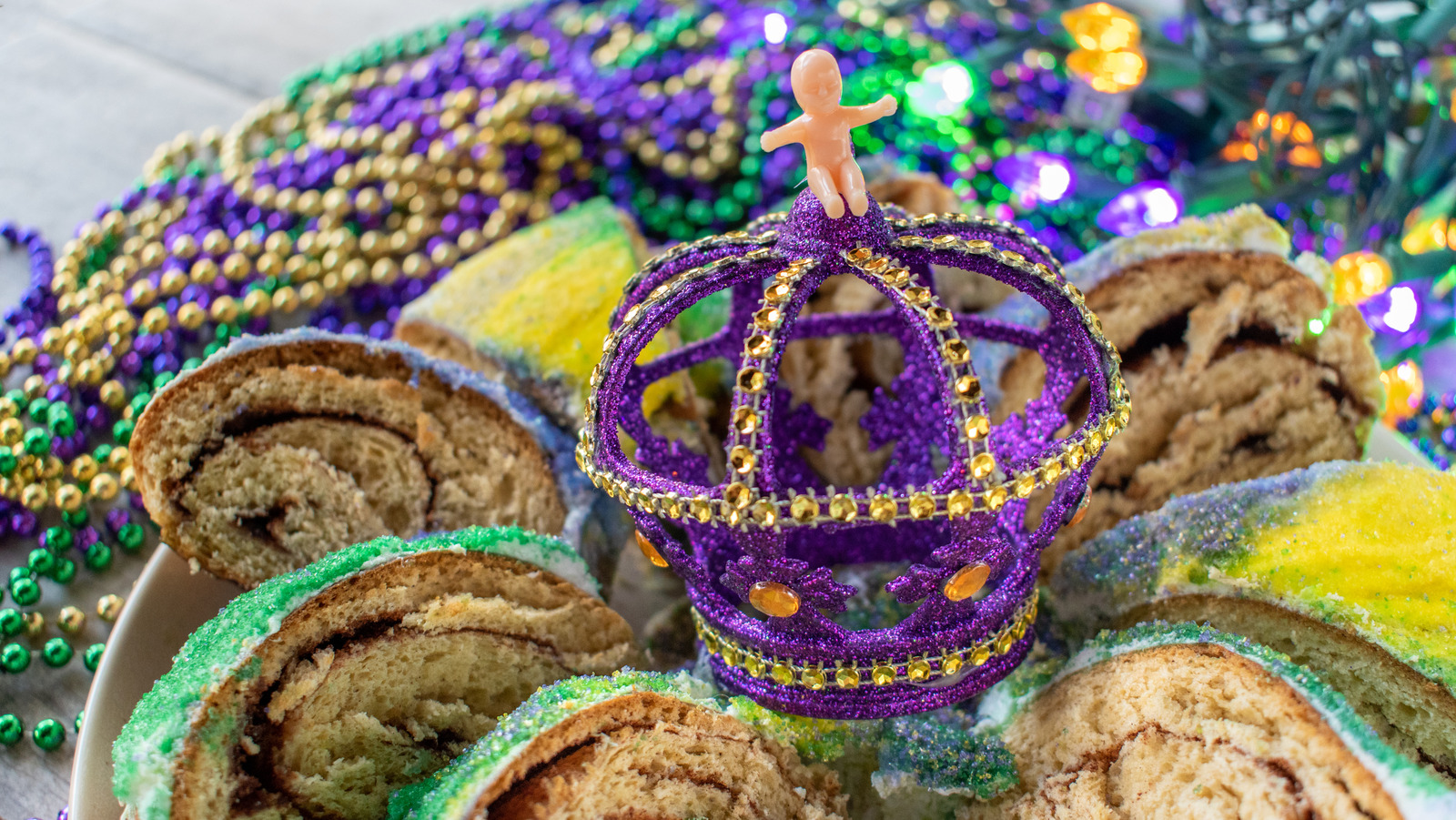 Why People Hide Plastic Babies In Mardi Gras Cakes