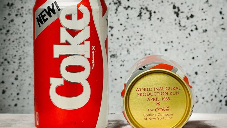 Two cans of New Coke, one on side to show bottom of caf pesticides and heavy metals. Here's what to know.</p>
            <span class=