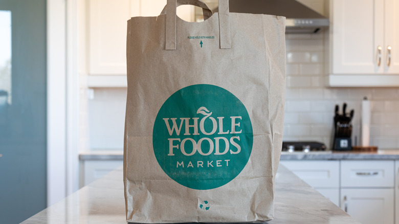 Whole Foods paper bag on kitchen counter