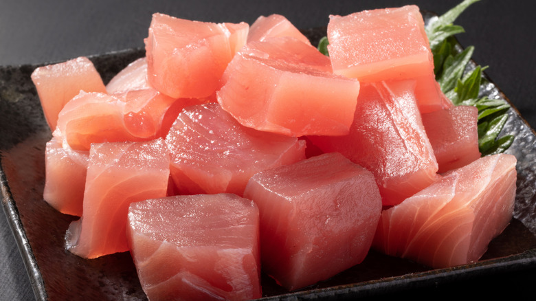 Cubed yellowfin tuna prepared for sashimi.